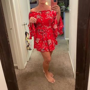 Super cute bright red floral romper.
